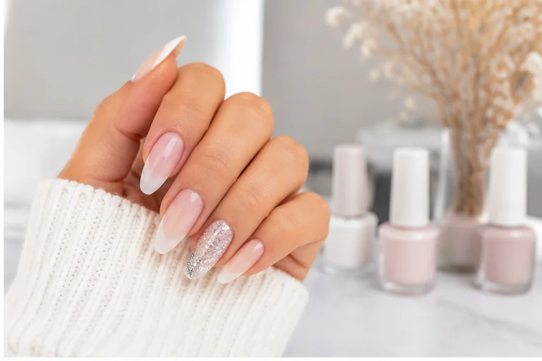 Beautiful pink and white nail extensions with elegant nail art
